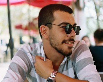 Portrait of young man wearing sunglasses