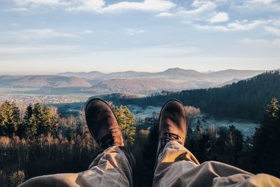 Low section of man against mountains