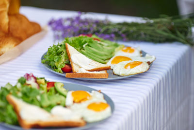 Close-up of breakfast served on table