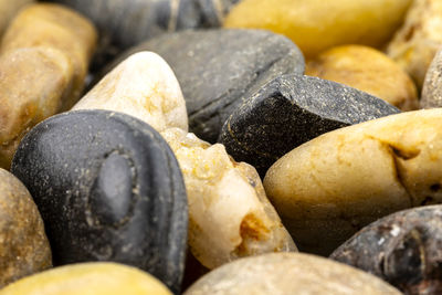 A macro shot of decorative colored pebbles, for use on a background.