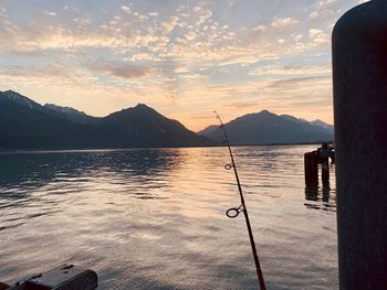 Scenic view of lake against sky during sunset