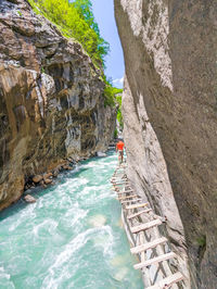 High angle view of sea against mountain