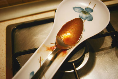 High angle view of fruits in plate on table