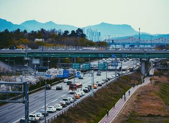 View of bridge in city against sky