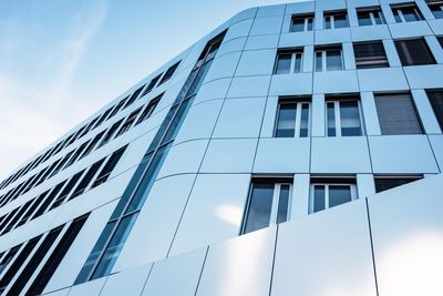 Low angle view of modern building against sky