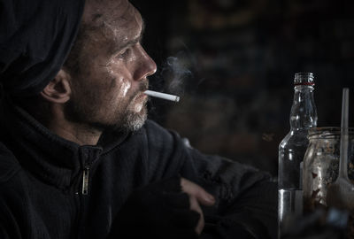 Close-up of man smoking cigarette