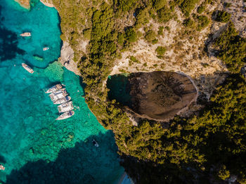 High angle view of rock formation in sea