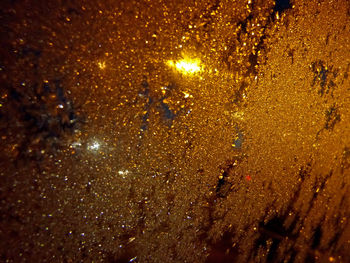 Close-up of illuminated lights at night