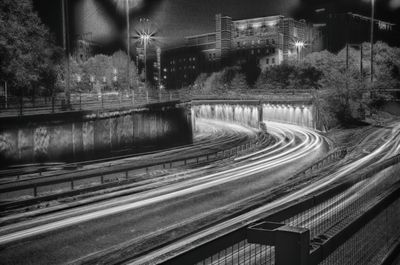 Light trails on street in city at night