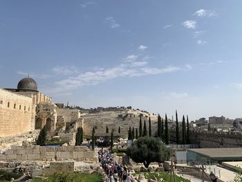 Buildings in city against sky