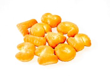 Close-up of oranges against white background