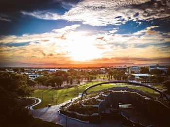 High angle view of cityscape against sky during sunset