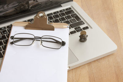 High angle view of eyeglasses on table