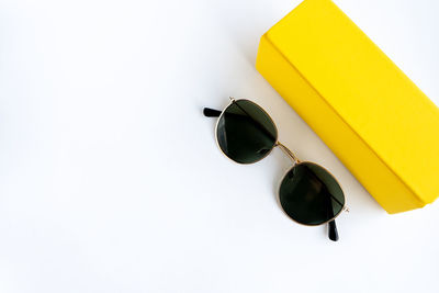 High angle view of lemon on table against white background