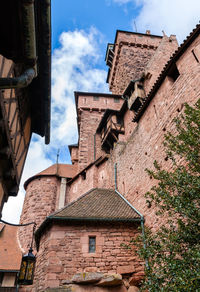 Low angle view of old building against sky