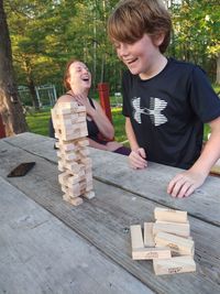 Friends on wooden table