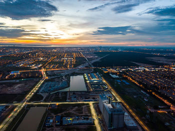 Aerial view of cityscape during sunset