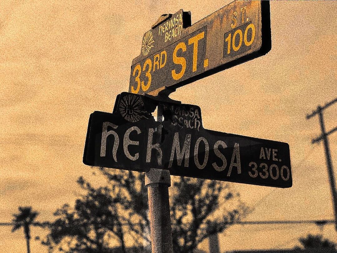 LOW ANGLE VIEW OF ROAD SIGN