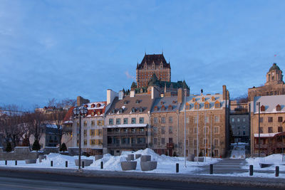 Buildings in city during winter