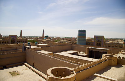 Buildings in city against sky