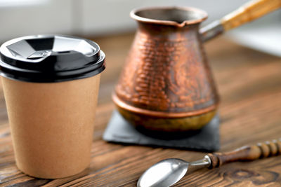 Close-up of coffee cup on table