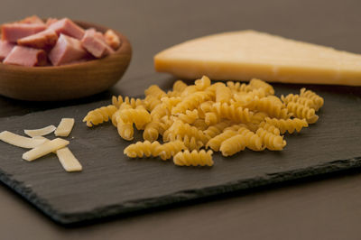 Close-up of chopped vegetables on table