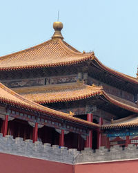 Exterior of temple against clear sky