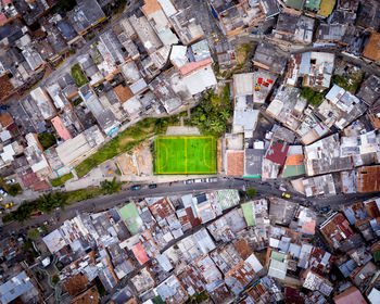 High angle view of illuminated buildings in city