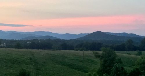 Scenic view of landscape against sky during sunset