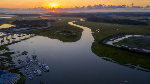 High angle view of lake against sky during sunset