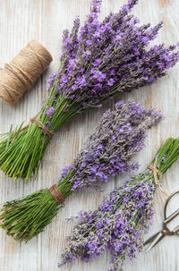 Seasonal pruning of lavender. a bunch of cut lavender and scissors. gardening concept