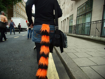 Man walking on street in city