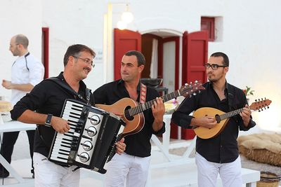 Men playing music at restaurant