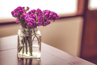 Close-up of flower vase on table