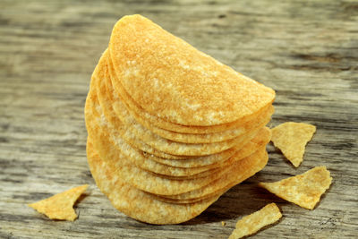 Close-up of potato chips on table