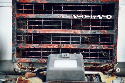 Old abandoned truck on brick wall