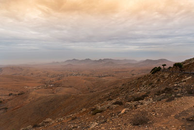 Scenic view of desert against sky