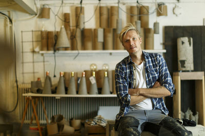 Man sitting in workshop