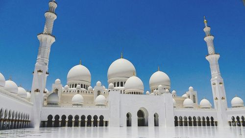 Low angle view of grand mosque against sky