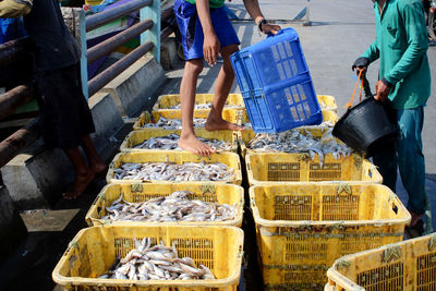 People at market stall in city