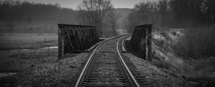 Railroad tracks in foggy weather