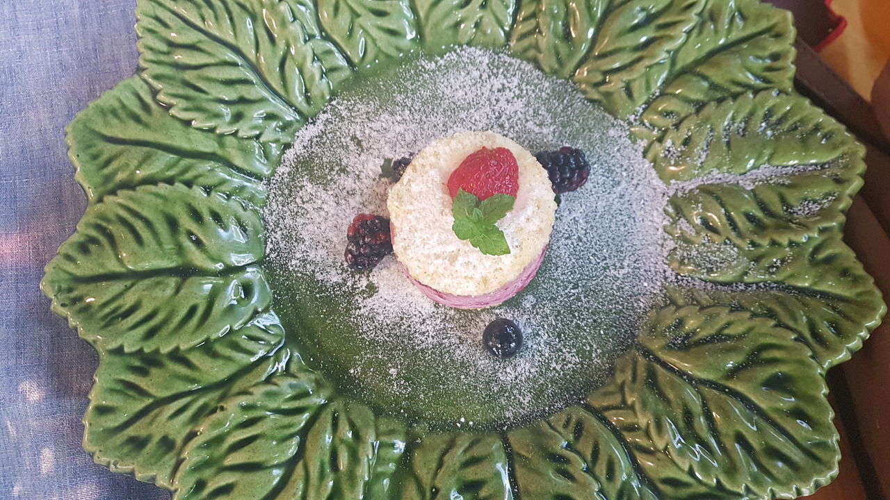 HIGH ANGLE VIEW OF FRUITS ON ICE CREAM