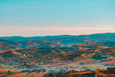 Aerial view of landscape against sky during sunset