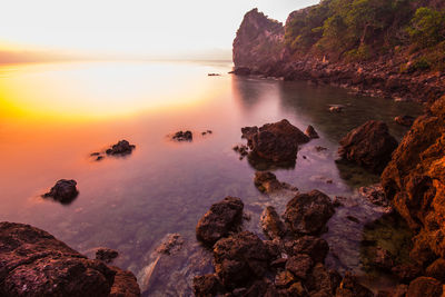 Scenic view of sea against sky during sunset