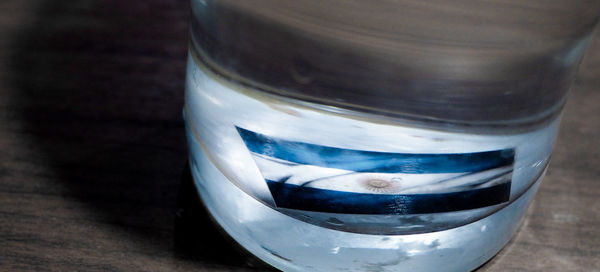 High angle view of drink in glass on table