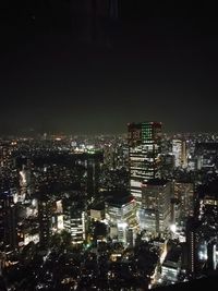 Illuminated cityscape at night