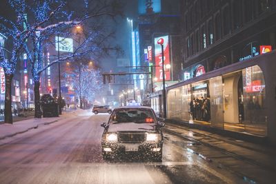 Traffic on city street at night