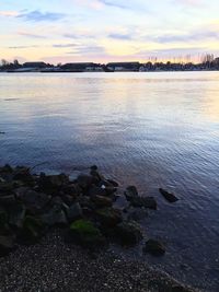 Reflection of clouds in water at sunset