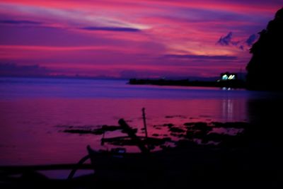 Scenic view of sea against sky at sunset