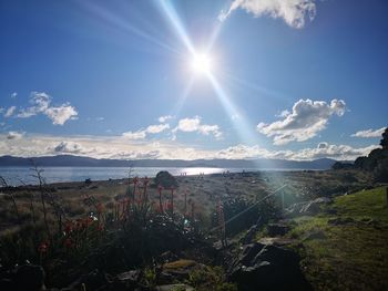 Panoramic view of landscape against sky on sunny day